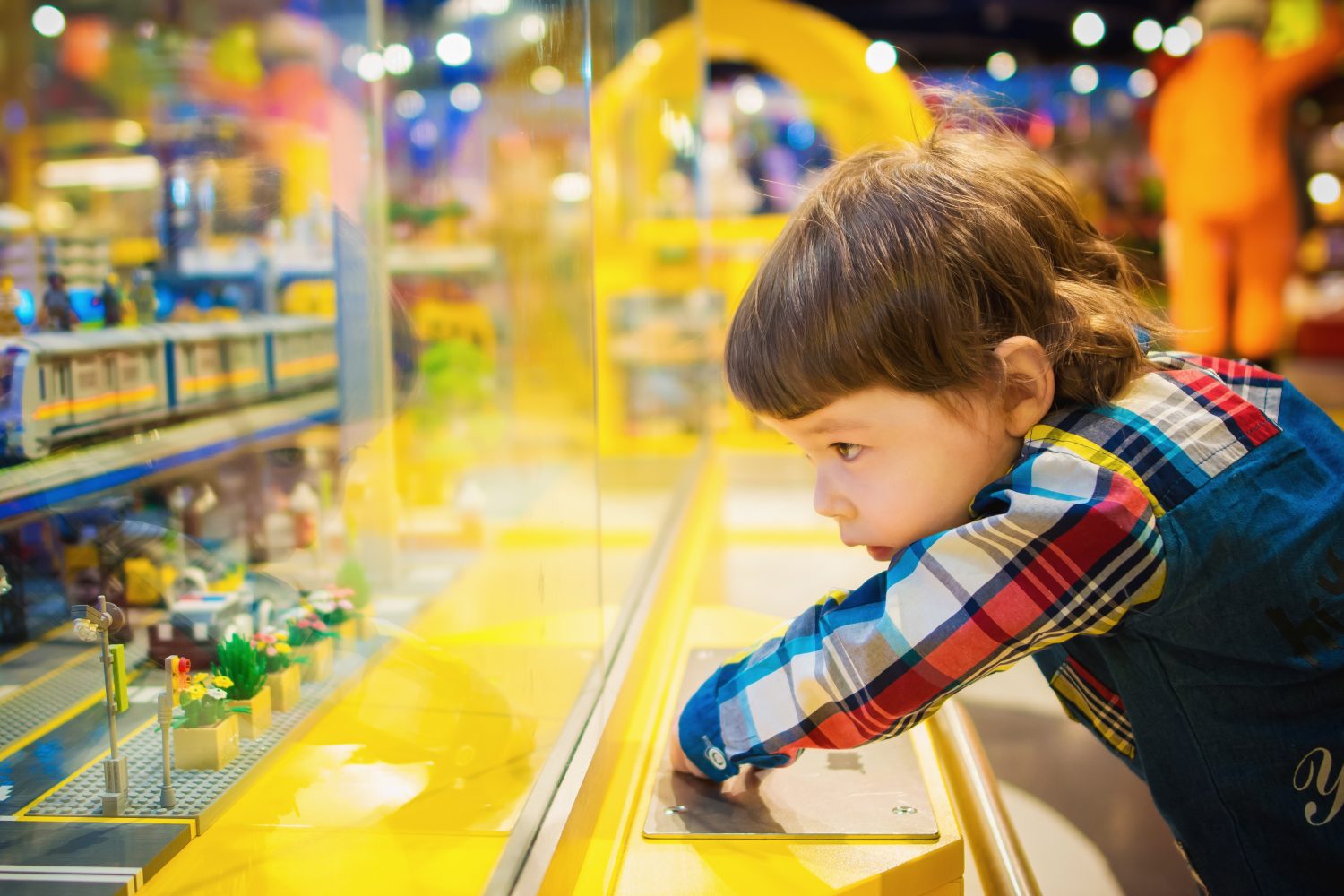 boy blurred playing with toys