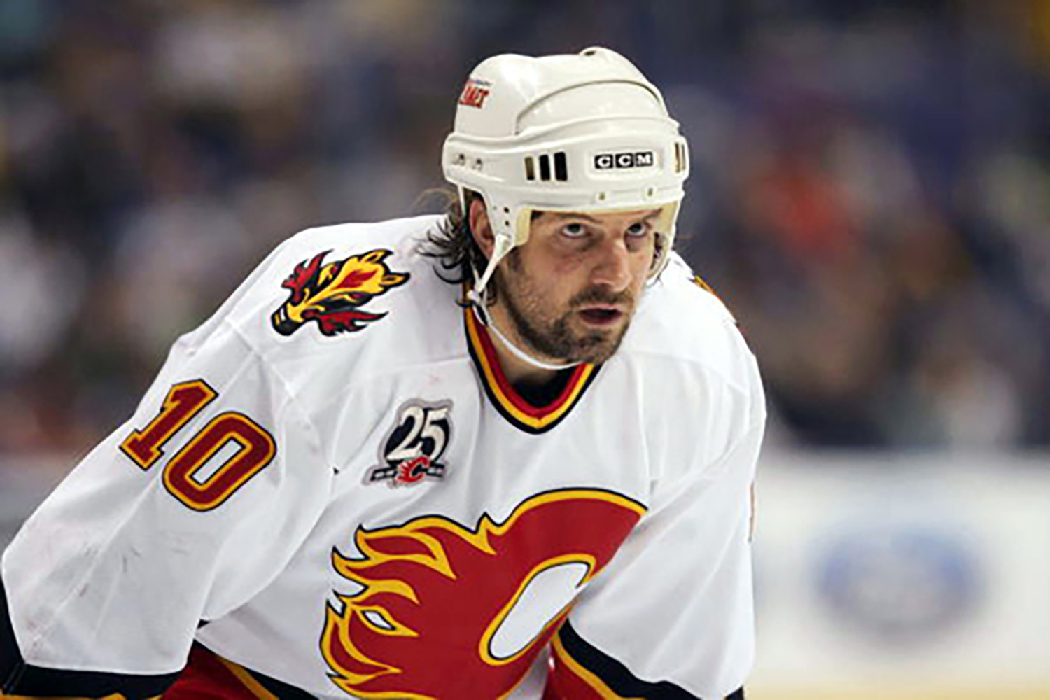 ST. LOUIS - JANUARY 30: Tony Amonte #10 of the Calgary Flames looks on during the game against the St. Louis Blues on January 30, 2006 at the Savvis Center in St. Louis, Missouri. The Blues defeated the Calgary Flames 3-2 in a sudden death shootout (Photo by Elsa/Getty Images).