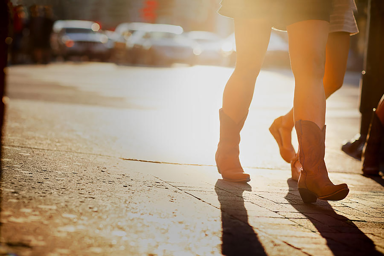 calgary stampede girl in cowboy boots walking