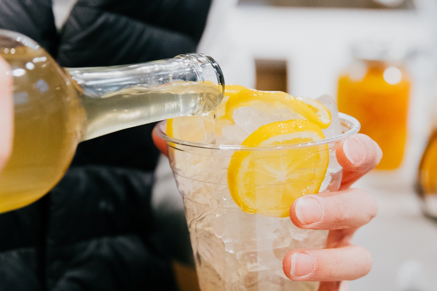 cafe alchemist pouring drink